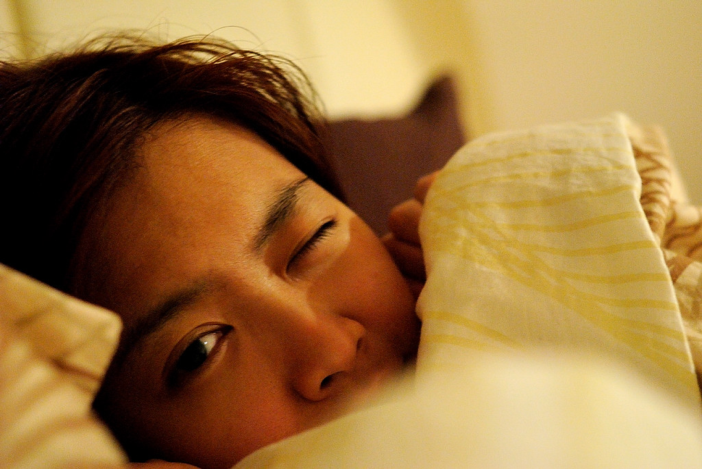 Sleeping wife gets surprise facial fan image