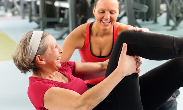 Fitness center senior woman exercise gym workout